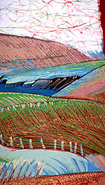 Part of batik with fields on hills, sea and sky, showing the "crackle" and texture.